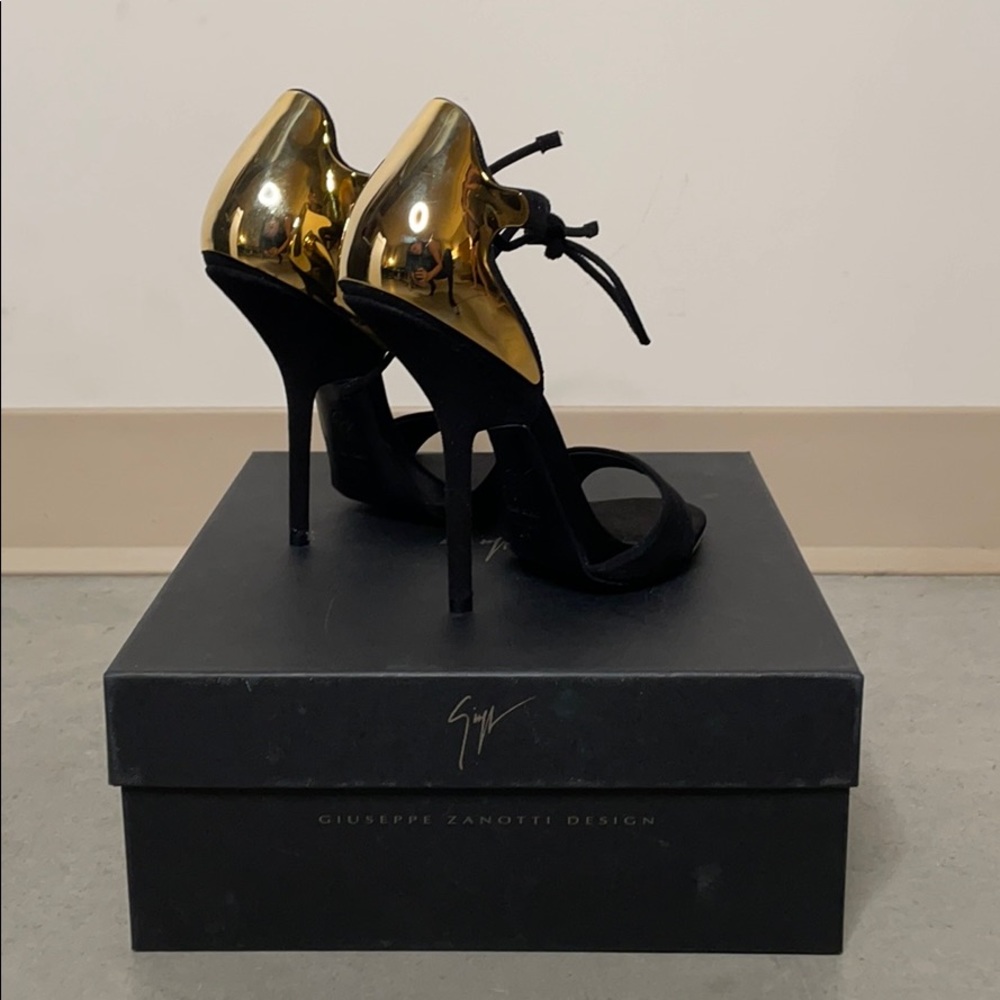 Giuseppe black stilettos with gold detail